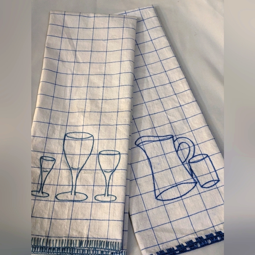 Vintage wine glass and pitcher embroidered tea towels. Like new.